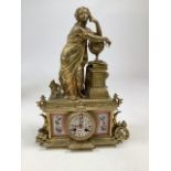 A French 19th century gilt-metal and porcelain mantel clock: the eight-day duration movement