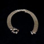 A 9ct gold flat link bracelet. 4.5g.