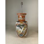 An Italian FG Ceramiche Artistiche table lamp in the Oriental style. Monogram mark to base.40cm(h)