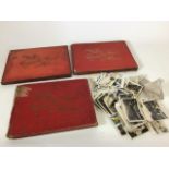 A collection of Wills cigarette card albums and an assortment of other cigarette cards