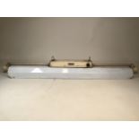 An industrial metal ceiling strip light by ComptonW:60cm x D:25cm x H:26cm Height includes hooks