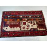 A Baluchi rug.W:146cm x H:90cm