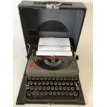 An Imperial Good Companion Model T typewriter in original case ( not in working order)