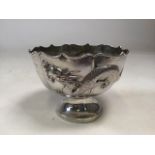CHINESE EXPORT SILVER 'DRAGON' BOWL on matted ground with circular stepped foot. Cumwo Hong Kong,