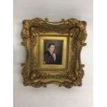 A miniature portrait of a distinguished 19th century gentleman. on white panel in gilt frame. with