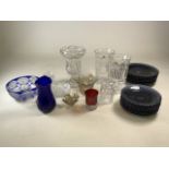 A mixed collection of glassware to include a Bristol blue glass vase by Peter Hewlett, red glass