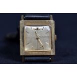 A mid 20th century Jaeger-Le Coultre 18k gold rectangular cased automatic wristwatch. Gold face with