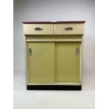 A Hygena 1950s kitchen larder cupboard, two sliding cupboard doors with air vents above. Two drawers