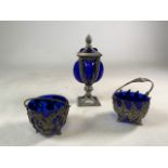 Three pieces of Bristol Blue glass including two white metal and glass baskets - one decorated