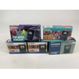 Five Casio hand held LCD colour televisions.