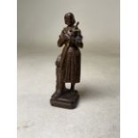 A bronzed figure of Jeanne D'Arc (Joan of Ark). Stamped on the back VM H:11cm