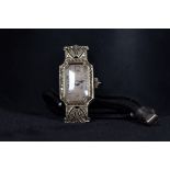 An early 20th century precious white metal and diamond ladies cocktail watch oblong 14mm x 35mm