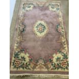 A modern Chinese rug.W:250cm x D:153cm