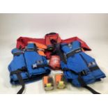 A quantity of buoyancy aids and a Helly Hansen sailing jacket with other accessories.jacket size XL
