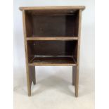 A small set of free standing pine shelves. and an oval occasional table with lower shelf.W:76cm