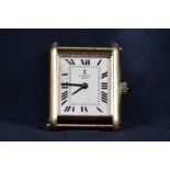 An 18ct gold gentlemans vintage wrist watch. Dial signed Richards Zegar . 22m x 24mm oblong case