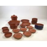 A collection of Oven to Table Honiton pottery with other items to include storage jar and flan