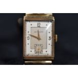 JAEGER-LE COULTRE: a 14ct gold cased gentlemans Art Deco wristwatch of rectangular form, champagne