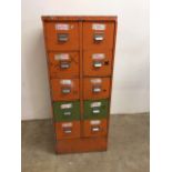 A metal storage double bank of drawers W:55cm x D:54cm x H:132cm