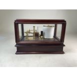 A 20th century mahogany five glass cased recording barograph. With numerous replacement papers.W: