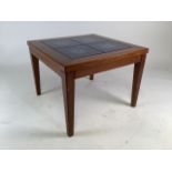 A GPlan style teak tile top side table. W:54cm x D:54cm x H:41cm