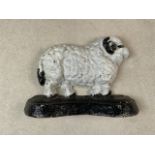 A cast iron sheep doorstop. W:21cm x H:15.5cm