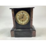A 19th century black slate and marble mantel clock, H:26cm
