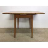 A mid century Formica topped extendable kitchen tableW:104cm x D:68cm x H:74cm