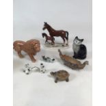 A collection of 20th Century ceramic ornaments including Wade and Beswick