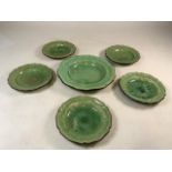 A set of six green glazed Dieulefit Poterie dishes. Largest W 34cm Smallest W 24cm