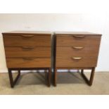 A pair of mid century Europa bedside cabinets with 3 drawers. Teak handles and legs - veneered body