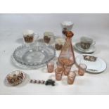 A collection of coronation ware and a glass decanter commemorating the festival of Britain 1951