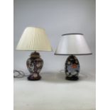 Two ceramic table lamps in the Chinese style. Black base W:19cm x H:30cm ( to top of ceramic base)