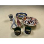 A collection of oriental style ceramic and cloisonne items. To include two rice spoons, two