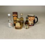 Five miniature bottle of alcohol and a Shorter & Son jug. Alcohol includes: Dettling cherry,