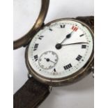 An early 20th century trench style watch.
