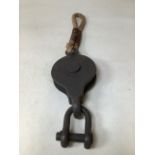A vintage pulley with rope handle W:15cm x D:4cm x H:66cm
