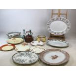 A collection of 1930s and earlier ceramics including dressing table set with tray, four platters