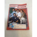 A signed copy of Radio1 on Show from 1980. Signed by Peter Powell on the front cover.
