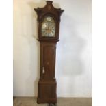 A George III mahogany long case clock with arched dial gilt spandrels, silver chapter ring named