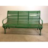 A late 19th early 20th century iron and wooden slatted garden bench. W:160cm x D:70cm x H:95cm