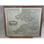 A late 19th century hand coloured map of the South West and South Wales. In glazed frame. W:56cm x