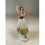 A Russian dancing figure of a lady. H:24cm