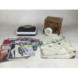 A Boxed Supreme hairdryer together with a collection of 1950s Womans Weekly and knitting patterns,