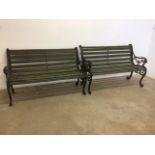 A near pair of Victorian style garden benches. Wooden slats and heavy metals ends. W:127cm x D: