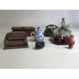 A collection of two mid century wooden boxes, a ceramic shell tea pot and other items of interest