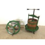 A Vigo vineyard apple press and classic fruit crusher with manual hand crank wheel.