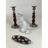 A pair of turned wood and chrome candlesticks together with a Russian ceramic stoat and a small
