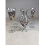 Six wine glass and jug with decorative moulded coloured glass sections Glasses W:9cm x H:31cm Jug