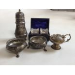 Small silver item napkin rings, mustard pot with spoon, salts and more.